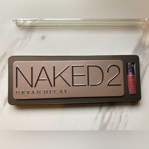 New Unused Urban Decay Naked 2 Full Palette. Comes with unused lip junkie.